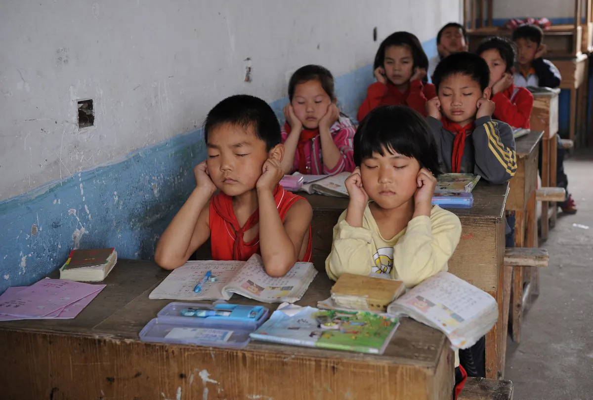 Chinese schoolchildren attend a class at a rural elementary school in Hefei, central China's Anhui province on May 12, 2010. (STR/AFP/Getty Images)