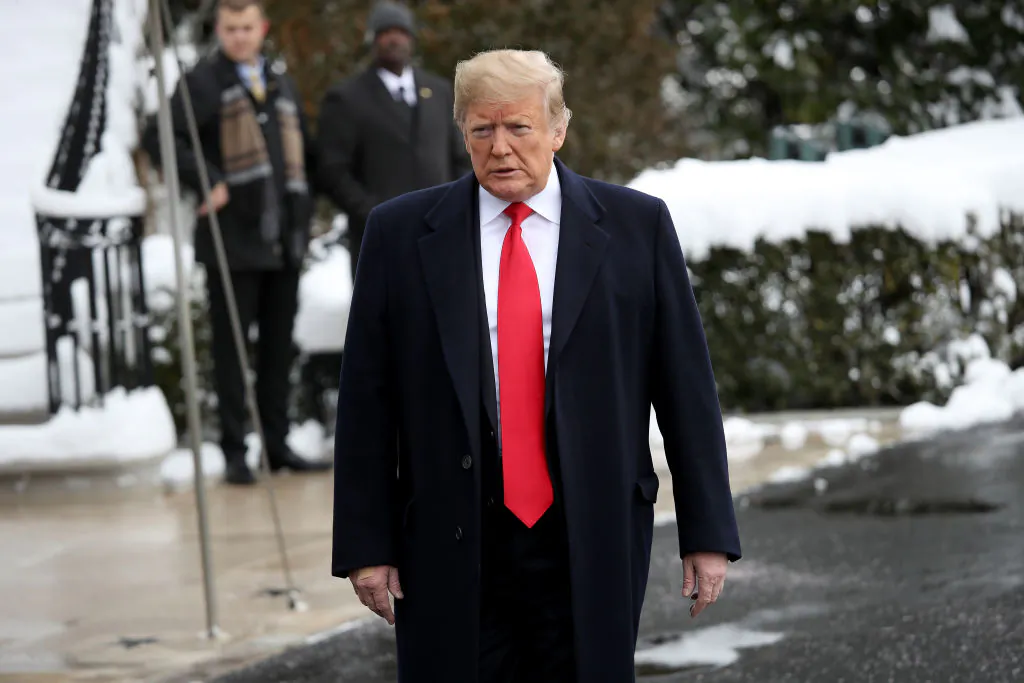 President Donald Trump arrives to answer questions from reporters as he departs the White House in Washington, on Jan. 14, 2019. (Win McNamee/Getty Images)