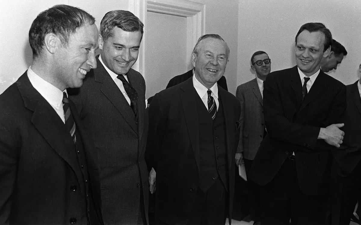 Prime Minister Lester B. Pearson (second right) and cabinet ministers Pierre Trudeau (left to right) John Turner and Jean Chretien talk in Ottawa, on April 4, 1967. (The Canadian Press/Chuck Mitchell)