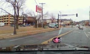 Charges Reveal How Minnesota Mom Dropped Toddler on Busy Road in Viral Video