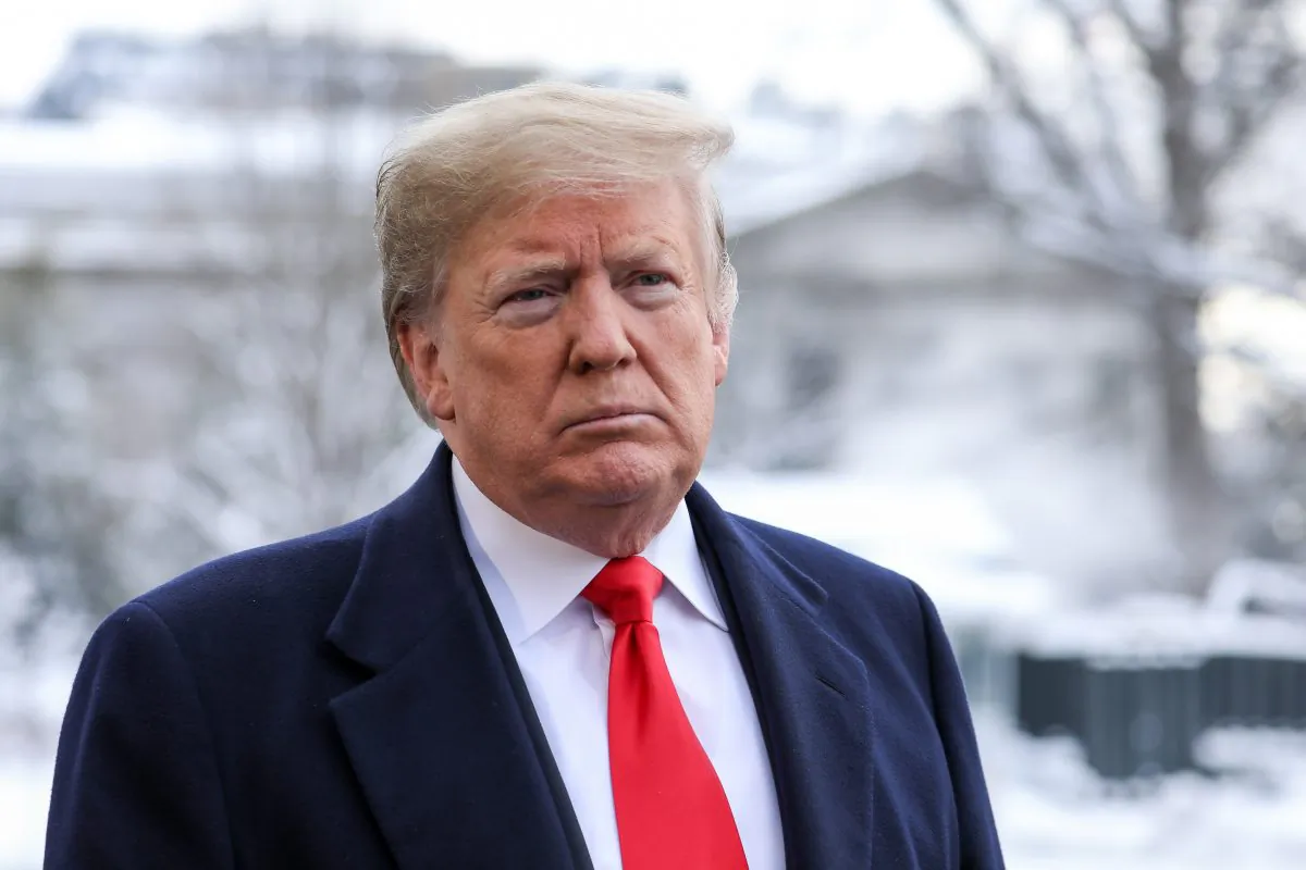 President Donald Trump speaks to reporters on the South Lawn of the White House in Washington on Jan. 14, 2019. (Holly Kellum/NTD)