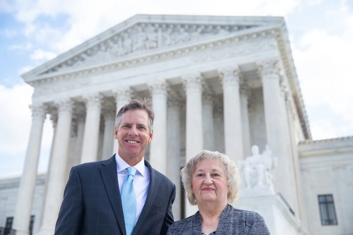 David Breemer (L) of the Pacific Legal Foundation and Rose Mary Knick on the steps of the Supreme Court building in Washington on Oct. 3, 2018. (Pacific Legal Foundation)