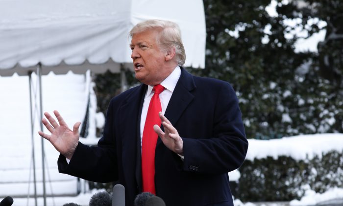 President Donald Trump speaks to reporters on the South Lawn of the White House in Washington on Jan. 14, 2019. (Holly Kellum/NTD)