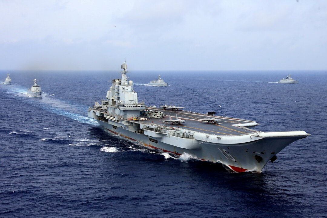 China's aircraft carrier Liaoning takes part in a military drill of Chinese People's Liberation Army Navy in the western Pacific Ocean on April 18, 2018. (Reuters)