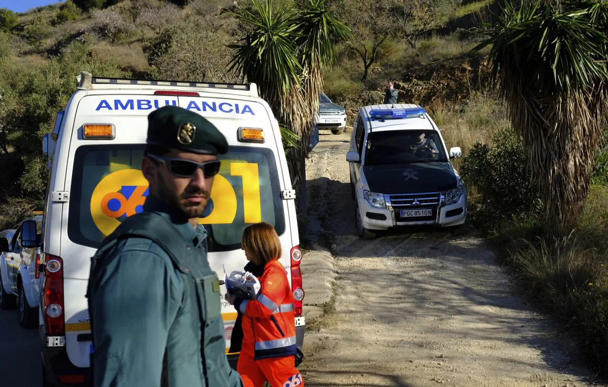 Emergency services look for a 2-year-old boy who fell into a well near the town of Totalán in Malaga, Spain, on Jan. 14, 2019. (AP Photo/Gregorio Marrero)