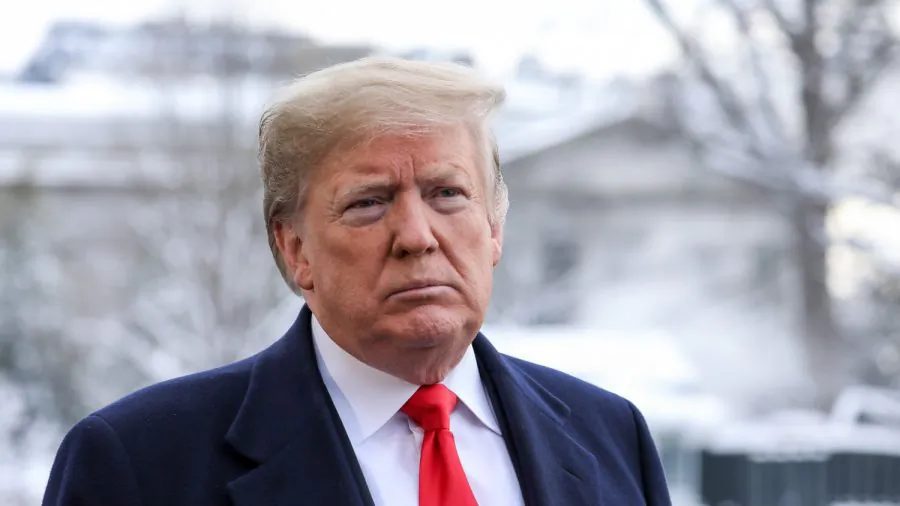 President Donald Trump speaks to reporters on the South Lawn of the White House on Jan. 14, 2019. (Holly Kellum/NTD)