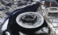 Hypnotic Moon-Like Giant Disc Appears on Maine River