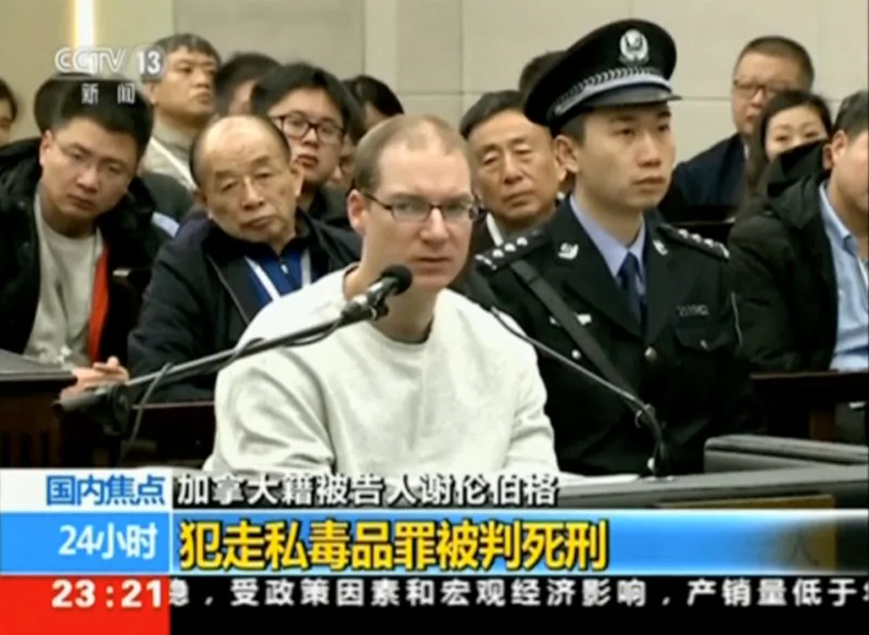 A still image taken from CCTV video shows Canadian Robert Lloyd Schellenberg in court, where he was sentenced with a death penalty for drug smuggling, in Dalian, Liaoning Province, China, on Jan. 14, 2019. (CCTV via Reuters)