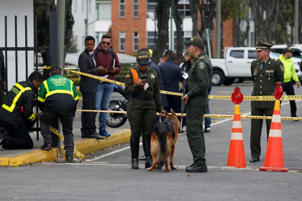 Police work close to the scene where a car bomb exploded, according to authorities, in Bogota, Colombia Jan. 17, 2019. (Reuters/Luisa Gonzalez)