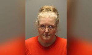 ‘Mother’ of 8 Adopted Children Arrested After Death of 9-Year-Old Daughter