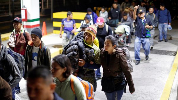 People belonging to a caravan of migrants from Honduras