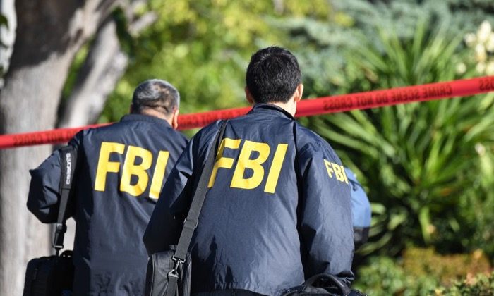 File photo of FBI investigators in Thousand Oaks, Calif., on Nov. 8, 2018. (Robyn Beck /AFP/Getty Images)