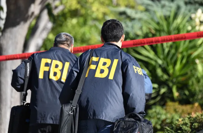 File photo of FBI investigators in Thousand Oaks, Calif., on Nov. 8, 2018. (Robyn Beck /AFP/Getty Images)