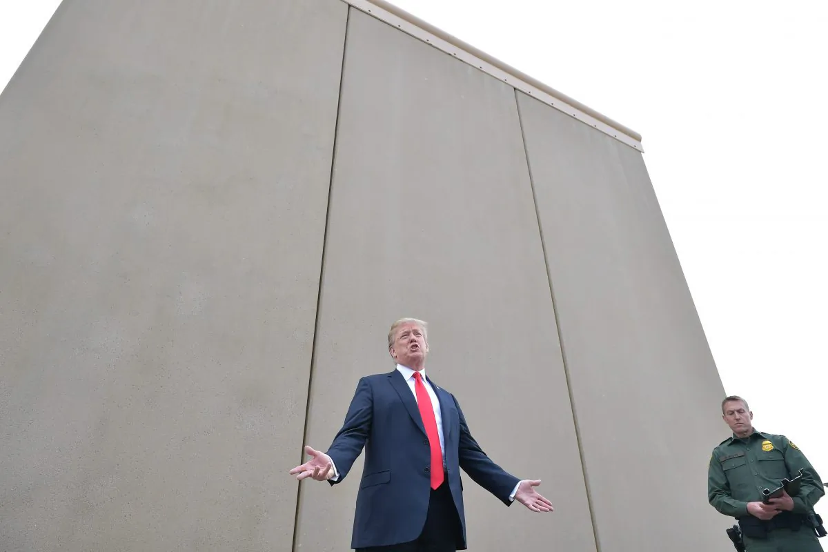 President Donald Trump inspects border wall prototypes with Chief Patrol Agent Rodney S. Scott in San Diego, Calif., on March 13, 2018.  (Mandel Ngan/AFP/Getty Images)