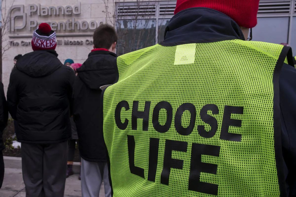 Demonstrators gather during a protest vigil sponsored by The Christian Defense Coalition and Priests for Life outside Planned Parenthood of Metropolitan Washington, Carol Whitehill Moses Center on Jan. 17, 2019, in Washington. (Zach Gibson/Getty Images)