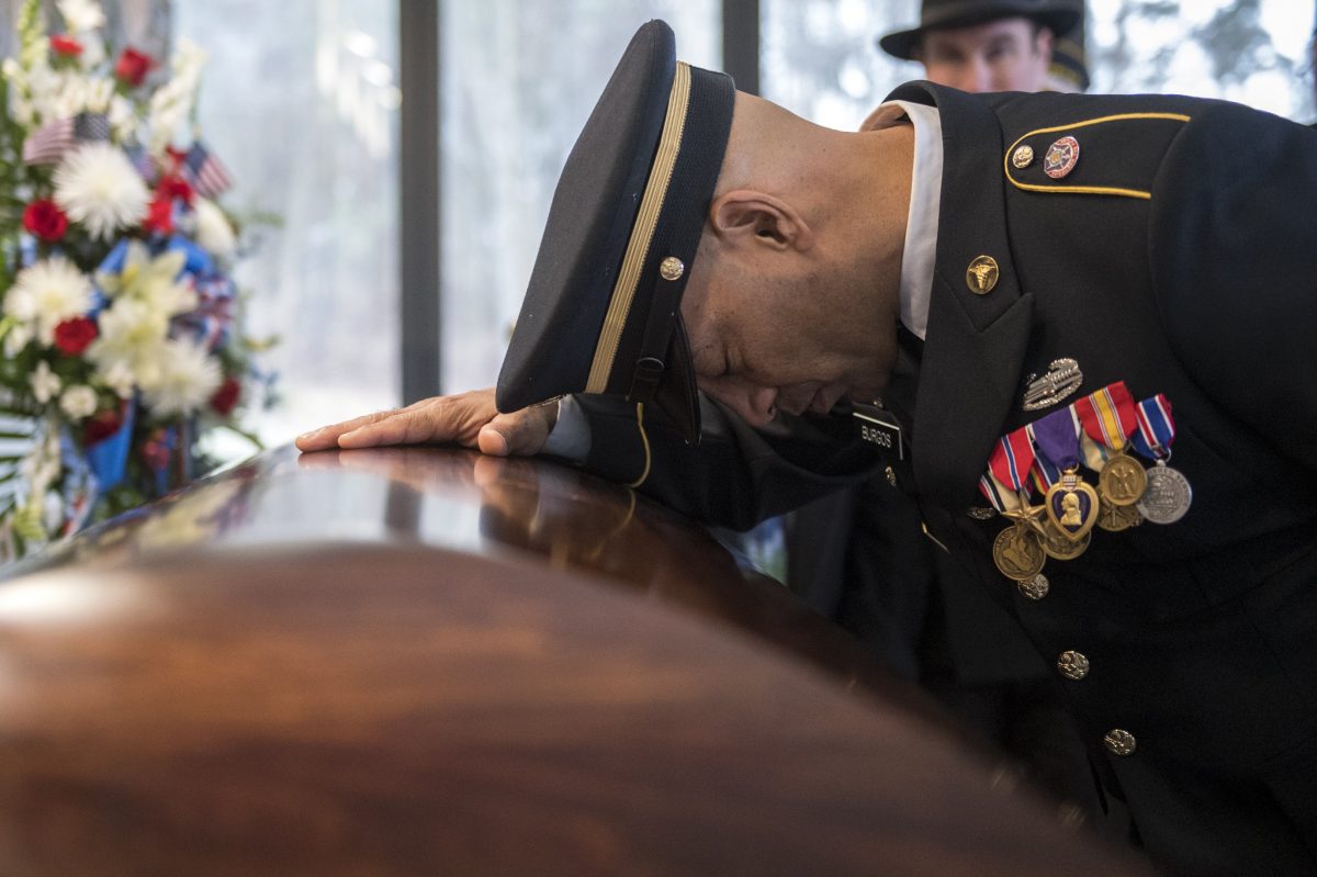 Jose-Burgos pauses-Peter-Turnpu-funeral-1