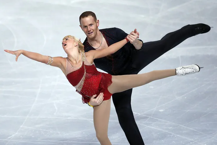 Caydee Denney and John Coughlin, of the United States, perform during their Pairs Short Program during the ISU Figure Skating Eric Bompard Trophy at Bercy arena in Paris, on Nov. 15, 2013. (Francois Mori/AP Photo/File)