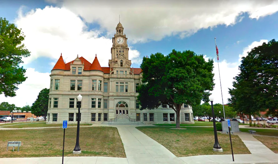 A couple has been sentenced to life in prison after they were found guilty of starving their adoptive daughter to death when she was 16 years old. The sentencing took place at the Dallas County Court House in Adel, Iowa, on Jan. 18, 2019. (Screenshot/Google Maps)