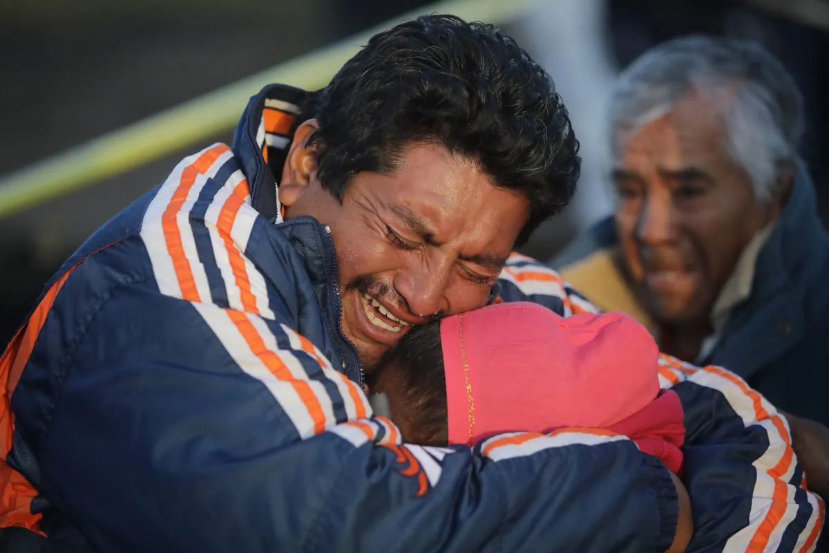 Family members of a victim cry when recognizing the body after an explosion in a pipeline belonging to Mexican oil company PEMEX on Jan. 19, 2019 in Tlahuelilpan, Mexico. (Hector Vivas/Getty Images)