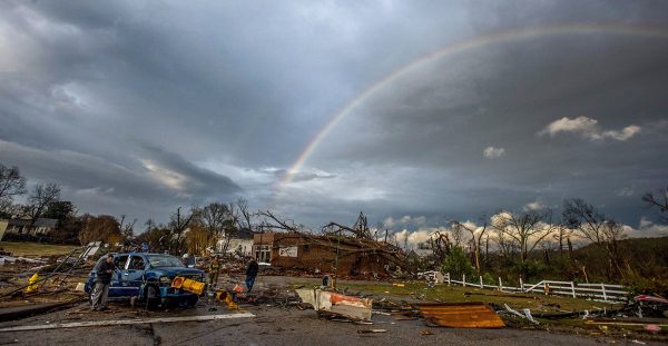 rainbow over damage from tornado