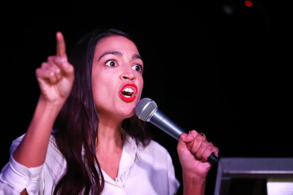 Alexandria Ocasio-Cortez (D-N.Y.) addresses the crowd gathered at La Boom night club in Queens in New York City, on Nov. 6, 2018. (Rick Loomis/Getty Images)