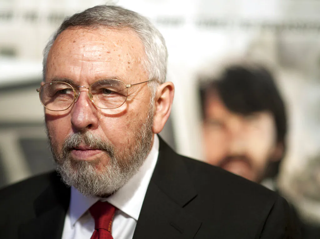 Antonio "Tony" Mendez, former CIA technical operations officer, poses for photographers at the premiere of the film Argo in Washington. (AP Photo/Cliff Owen)