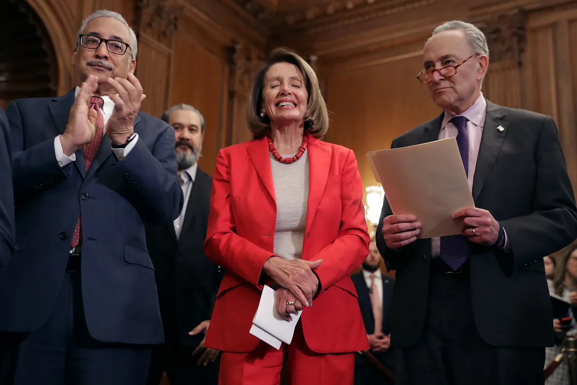 (L-R) House Education and Labor Chairman Bobby Scott (D-Va.), Speaker of the House Nancy Pelosi (D-Calif.) and Senate Minority Leader Charles Schumer (D-N.Y.) attend an event to introduce the Raise The Wage Act in the Rayburn Room at the U.S. Capitol in Washington on Jan. 16, 2019. (Chip Somodevilla/Getty Images)