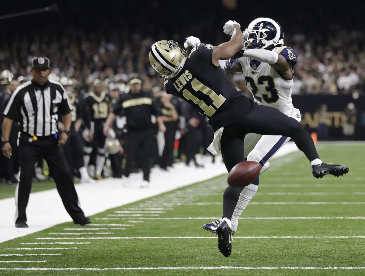 New Orleans Saints wide receiver Tommylee Lewis is hit by Los Angeles Rams defensive back Nickell Robey-Coleman during the second half the NFL football NFC championship game in New Orleans, on Jan. 20, 2019. (Gerald Herbert/AP Photo)