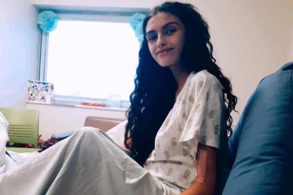 Brianna on a hospital bed