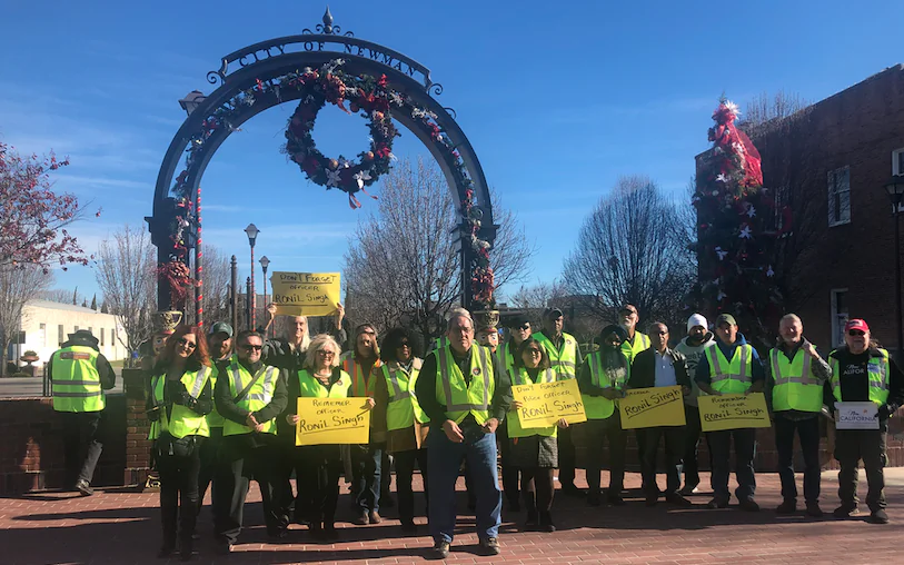 The New California State movement protests against the sanctuary state policy in Newman City, Calif., on Jan. 1, 2019. Founder Paul Preston is seen center front. (Nathan Su/The Epoch Times)