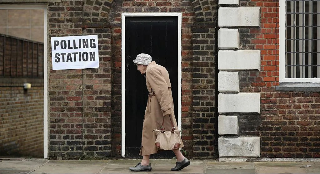A member of the public arrives to cast her vote in the EU referendum at Royal Hospital Chelsea on June 23, 2016, in London. Photo by Dan Kitwood/Getty Images