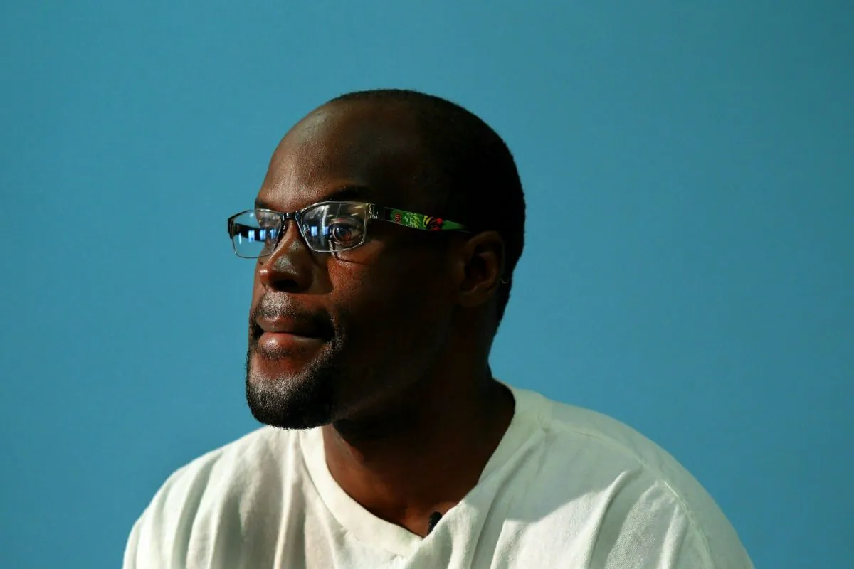 In this Thursday, July 10, 2014 photo, Bobby Bostic poses for a portrait in the visitation room at the Crossroads Correctional Center in Cameron, Mo., where he has served 23 years of a 241-year sentence for a 1995 robbery. (Robert Cohen/St. Louis Post-Dispatch via AP)