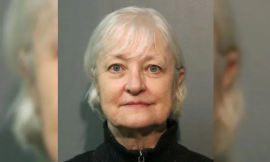 Woman Charged With Sneaking Onto Flight Doing Well