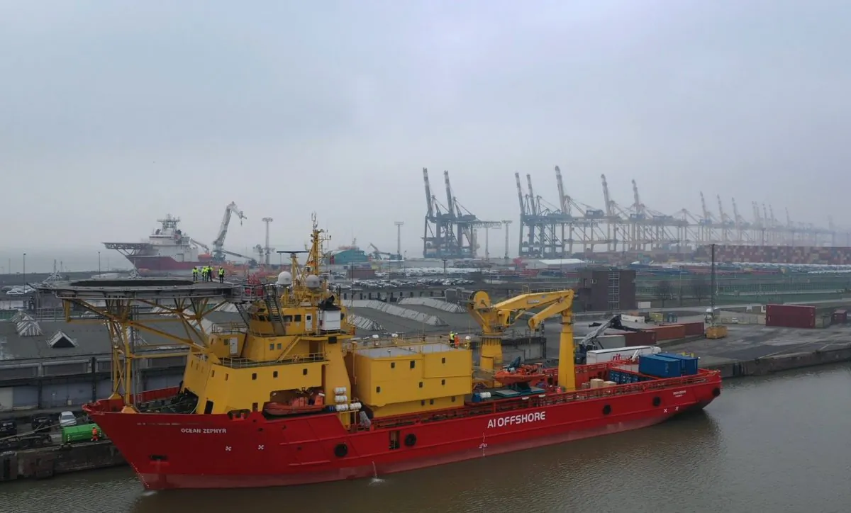 People stand on the helipad of the Ocean Zephyr in the docks in Bremerhaven, Germany, on Jan. 23, 2019. (Stephen Barker/AP Photo)