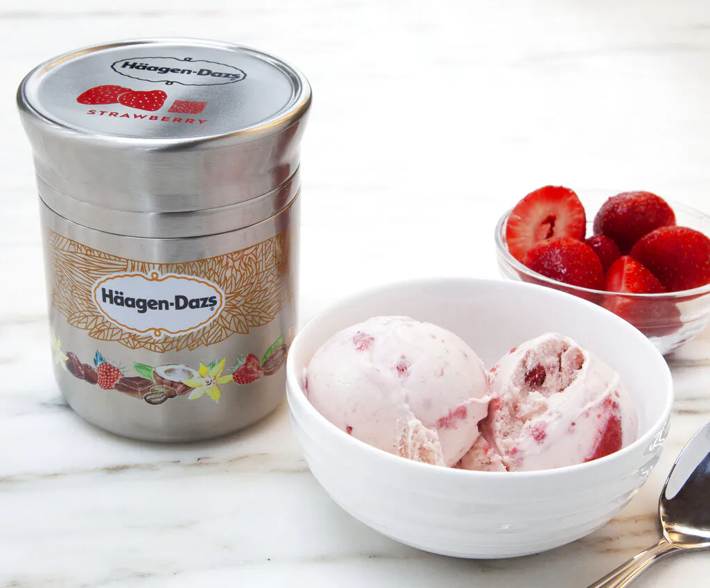 This photo shows Nestle's stainless steel Häagan-Dazs ice cream container designed for use with Loop. The new shopping platform announced at the World Economic Forum aims to change the way people buy many products, from food to personal-care and home products. Loop would do away with disposable containers for some name-brand products, including some shampoos and laundry detergents. Instead, those products would be delivered in sleek, reusable containers that will be picked up at your door, washed and refilled. (Chris Crane/TerraCycle via AP)