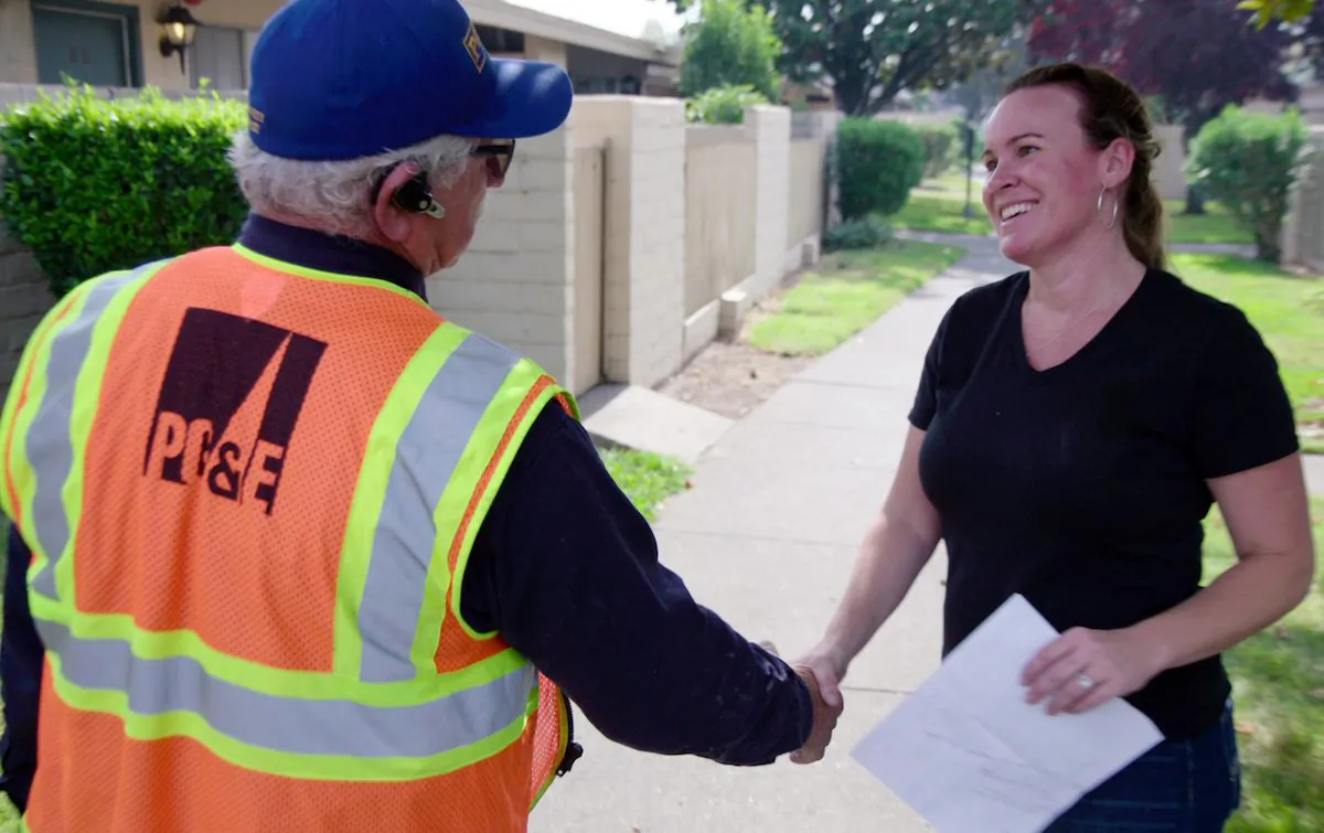 An undated photo of PG&E staff meeting with customers. (Courtesy of PG&E)