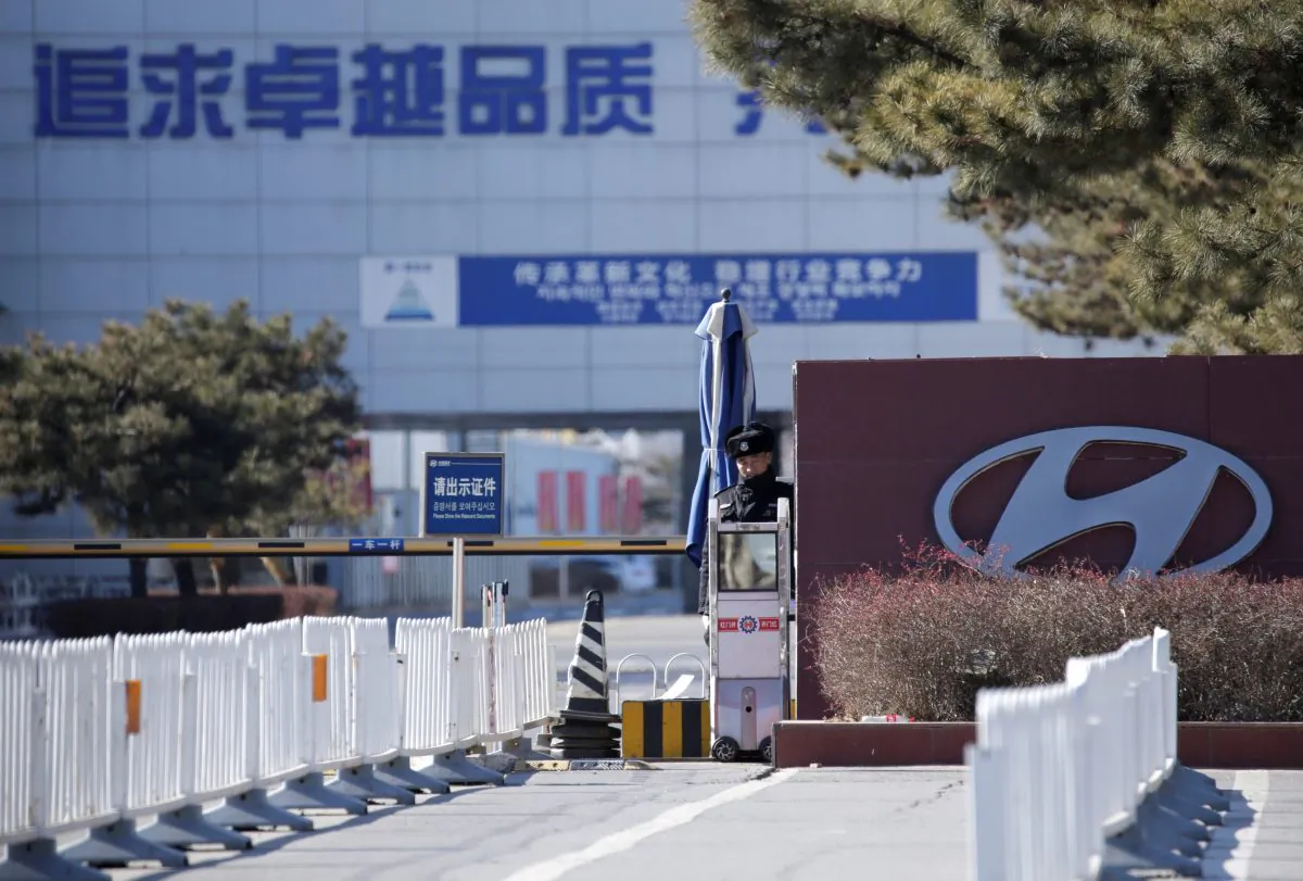 A security guard is seen at the main entrance of a plant of Hyundai Motor Co on the outskirts of Beijing on Jan. 25, 2019. (Jason Lee/Reuters)