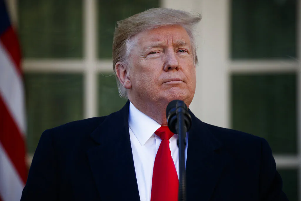 President Donald Trump announces a deal to temporarily reopen the government, in the Rose Garden of the White House, Jan. 25, 2019. (Evan Vucci/AP Photo)