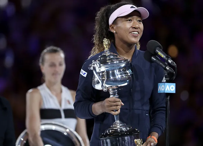 Japan's Naomi Osaka holds her trophy after defeating Petra Kvitova, left, of the Czech Republic during the women's singles final at the Australian Open tennis championships in Melbourne, Australia, on Jan. 26, 2019. (Mark Schiefelbein/AP Photo)
