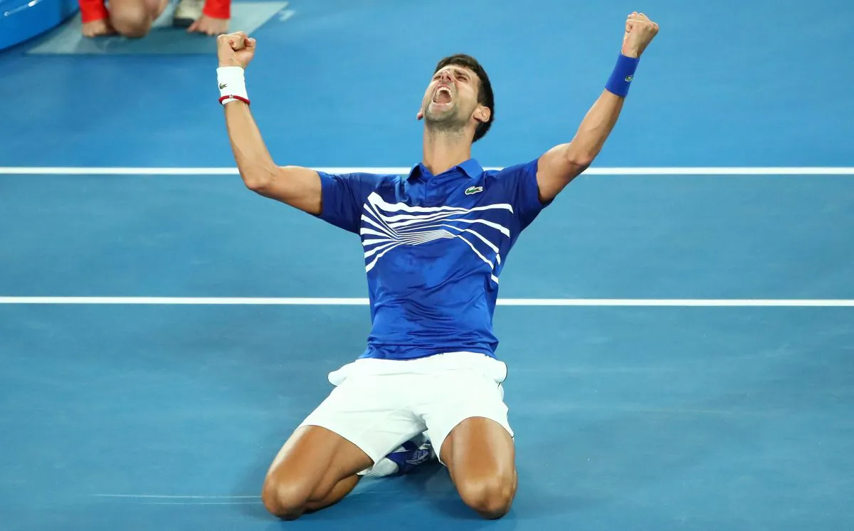 Novak Djokovic of Serbia celebrates after winning championship point in his Men's Singles Final match against Rafael Nadal of Spain during day 14 of the 2019 Australian Open at Melbourne Park in Melbourne, Australia on Jan. 27, 2019.  (Scott Barbour/Getty Images)