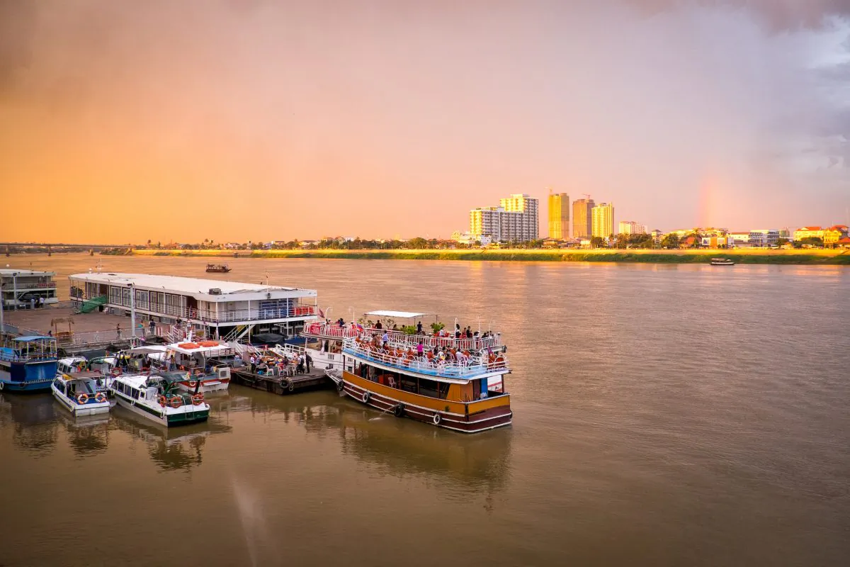 Tourist boats at a pier on the Mekong River in Phnom Penh, capital of Cambodia. (Shutterstock.com)