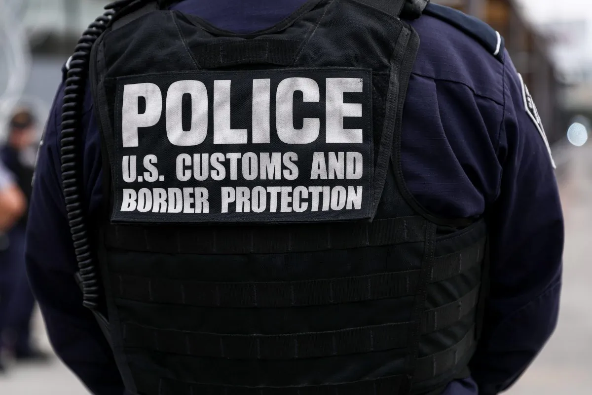 Customs and Border Protection agents check pedestrians as they exit Mexico into the customs area of the United States on the east side of the San Ysidro port of entry in Tijuana, Mexico, on Nov. 19, 2018. (Charlotte Cuthbertson/The Epoch Times)