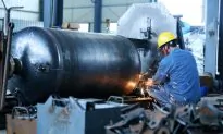 China’s Industrial Profits Shrink Again in Dec. on Weak Prices, Demand