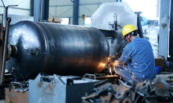 China’s Industrial Profits Shrink Again in Dec. on Weak Prices, Demand