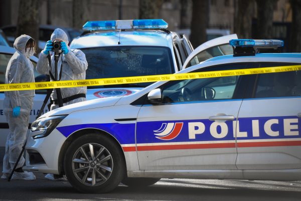 Forensic police officers outside the courthouse in Tarascon
