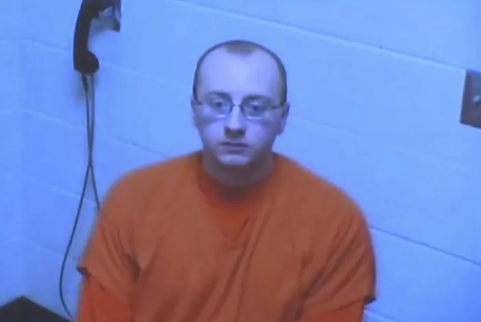 Jake Thomas Patterson, 21, makes his initial court appearance via video feed from the Barron County jail during his bond hearing in Barron, Wis. on Jan 14, 2019. (KSTP-TV via AP, Pool, File)