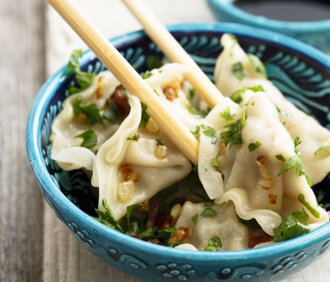 For many Chinese families, making dumplings is synonymous with Chinese New Year's Eve. (Shutterstock)