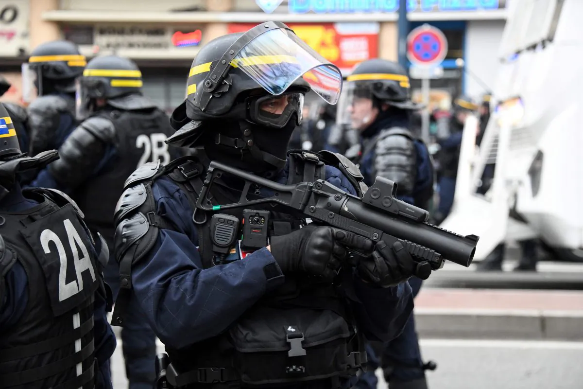 A French riot police officer holds a rubber bullet gun during a 'yellow vest' protest in Toulouse, France, on Jan. 26, 2019. (Pascal Pavani/AFP/Getty Images)