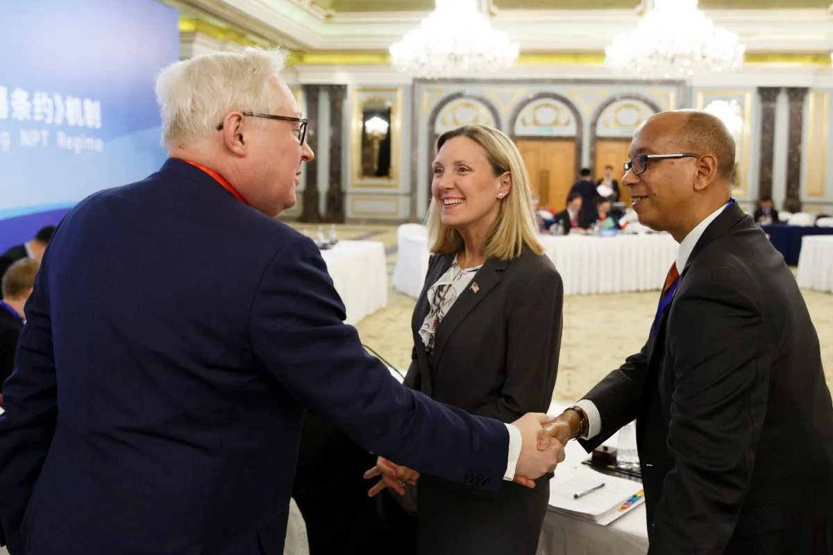 Russian Deputy Foreign Minister Sergey Ryabkov (L) greets U.S. delegation head Undersecretary of State Andrea Thompson (C) and U.S. Permanent Representative to the Conference on Disarmament Robert Wood at a Treaty on the Non-Proliferation of Nuclear Weapons (NPT) conference with the U.N. Security Council's five permanent members (P5) China, France, Russia, Britain, and the United States, in Beijing, Jan. 30, 2019. (Thomas Peter/Reuters)