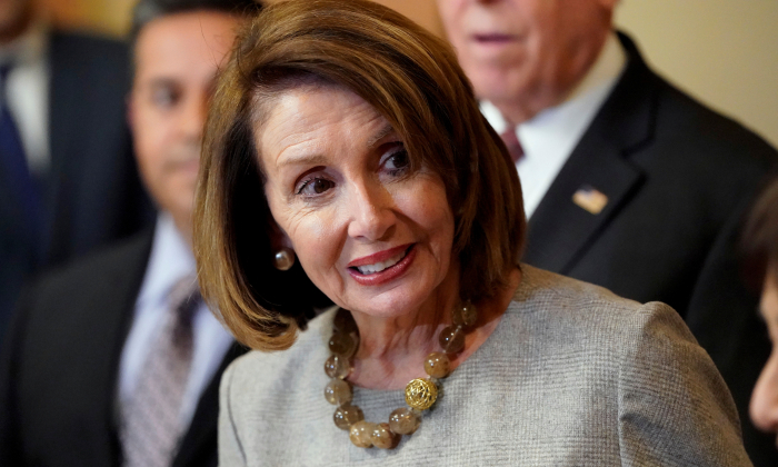 Speaker of the House Nancy Pelosi (D-CA) arrives to sign legislation during an enrollment ceremony before sending it to U.S. President Donald Trump for his signature to end the partial government shutdown on Capitol Hill in Washington, U.S., Jan. 25, 2019. (Joshua Roberts/Reuters)